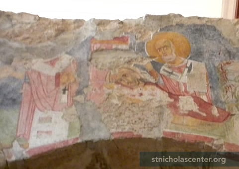 Nicholas visiting man lying down Nicholas visiting man lying down