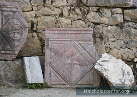 Carved stones propped up in courtyard Carved stones propped up in courtyard