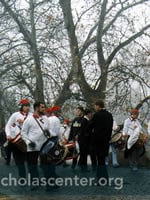 Drummers in white shirts, red & green hats Drummers in white shirts, red & green hats