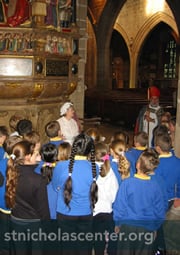 St Nicholas with school children at Newcastle Cathedral St Nicholas with school children at Newcastle Cathedral