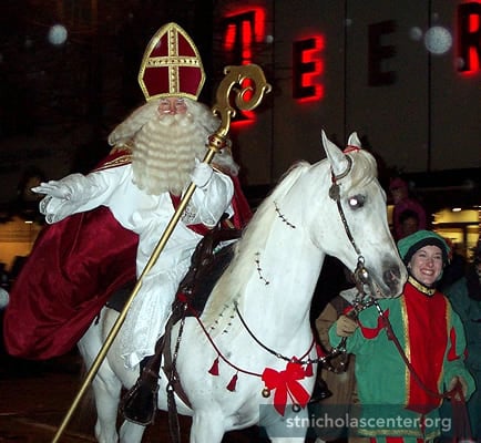 Sinterklaas on horse in street parade Sinterklaas on horse in street parade
